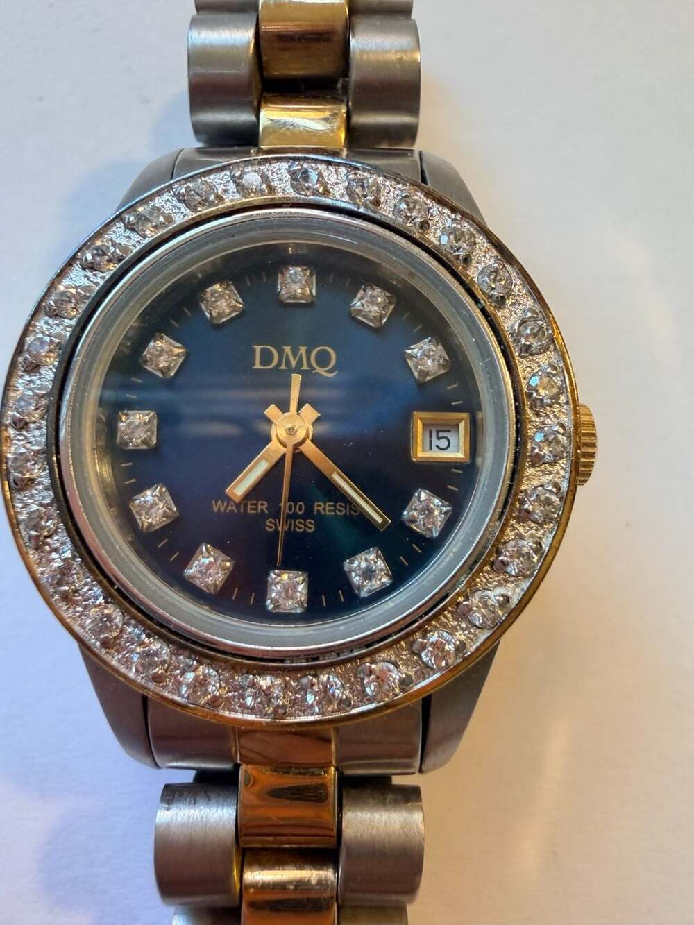 DMQ Women's Two-Tone Crystal Bezel Watch Blue Dial Swiss Movt DQ/4021